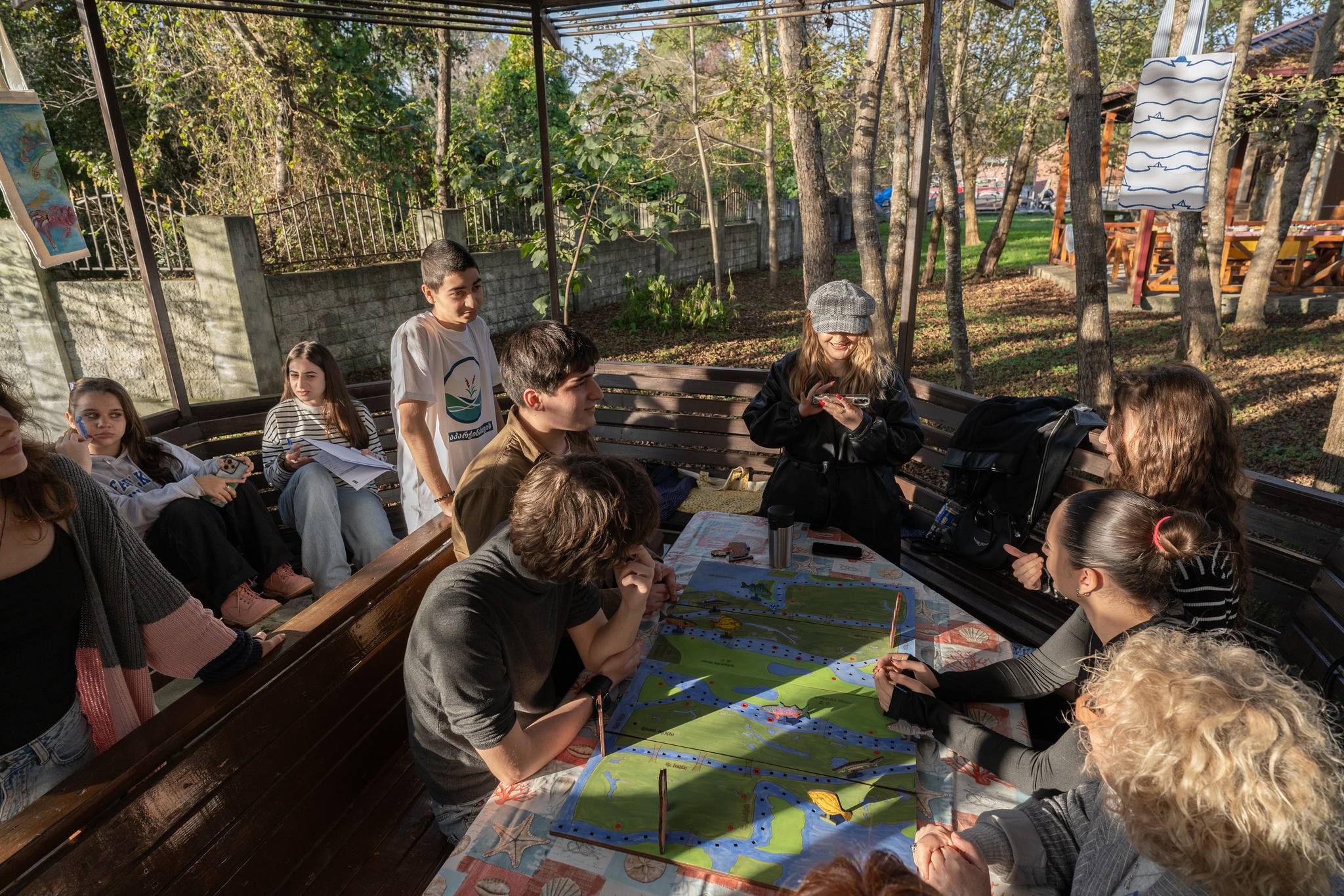 Community volunteers participating in river cleanup activities along Kaparchina River